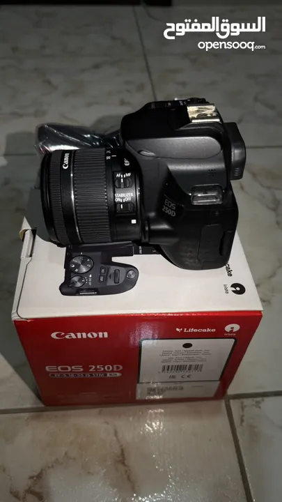 للبيع كاميرا Canon 250D شبه جديدة مع جميع معداتها