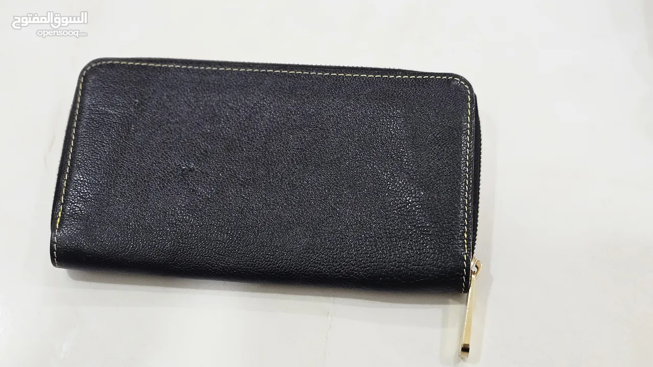 Louis Vuitton 2010 Suhali Leather Zippy Wallet