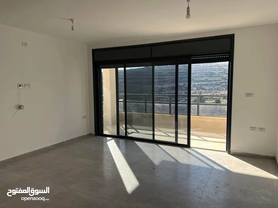 شق للبيع في عين منجد لم تسكن من قبل