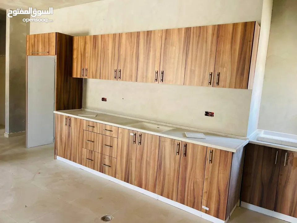 دفعة 1000 شيكل والباقي شيكات وفصل المطبخ الي بناسبك