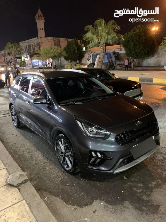 كيا نيرو هايبرد 2020  تورنج اعلا صنف عدا الفتحه مميزه جدا بحال الوكاله