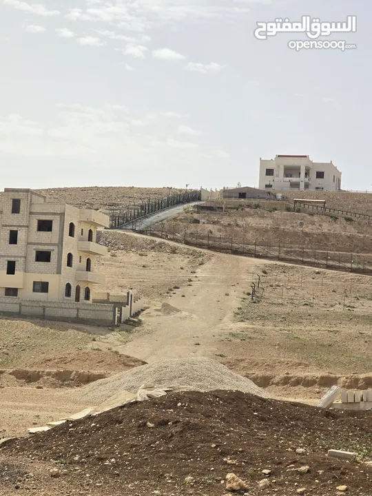 أرض على شارع المية ممر عمان التنموي للبيع