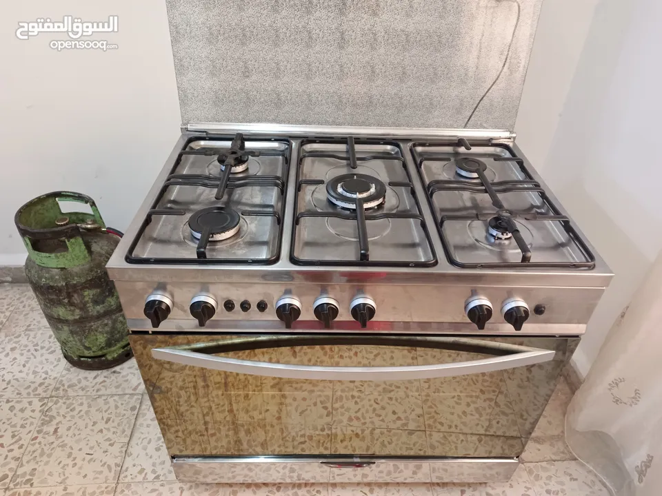غاز تكنو ستانلس 5 عيون 6 مفاتيح مروحة توزيع حرارة و تبريد بالفرن قدحة و امان بالفرن شغال100% منفوض