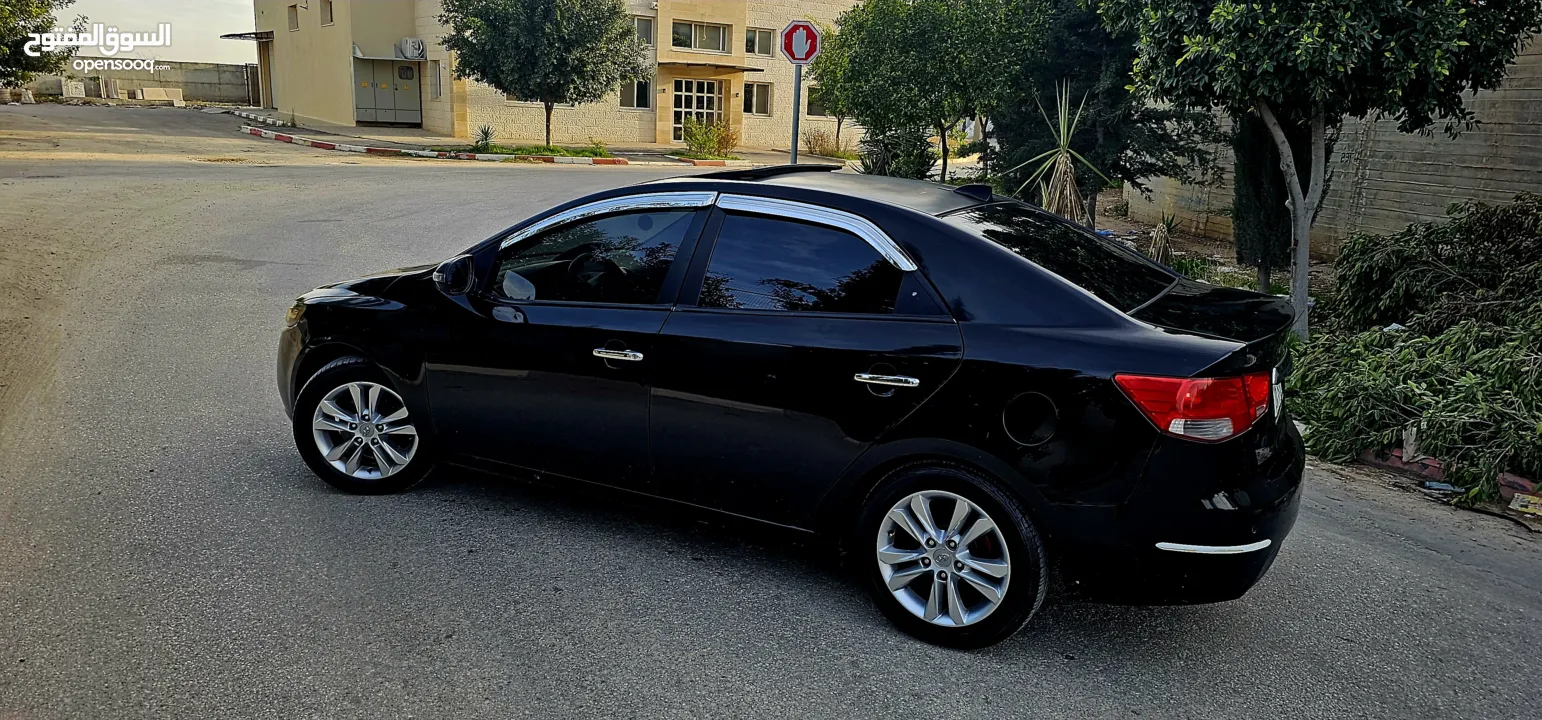 كيا فورتي فل مع فتحه سقف وبصمه 2011 اصل برايفت