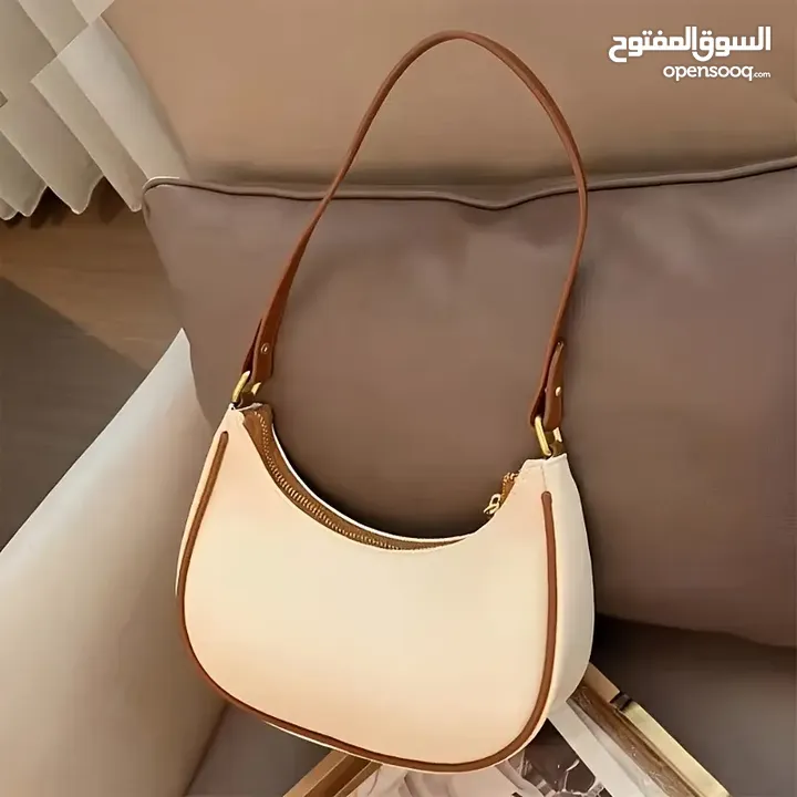 حقيبة يد فرنسية فاخرة - تصميم نصف قمر بسحاب عملي – لون بيج أنيق
