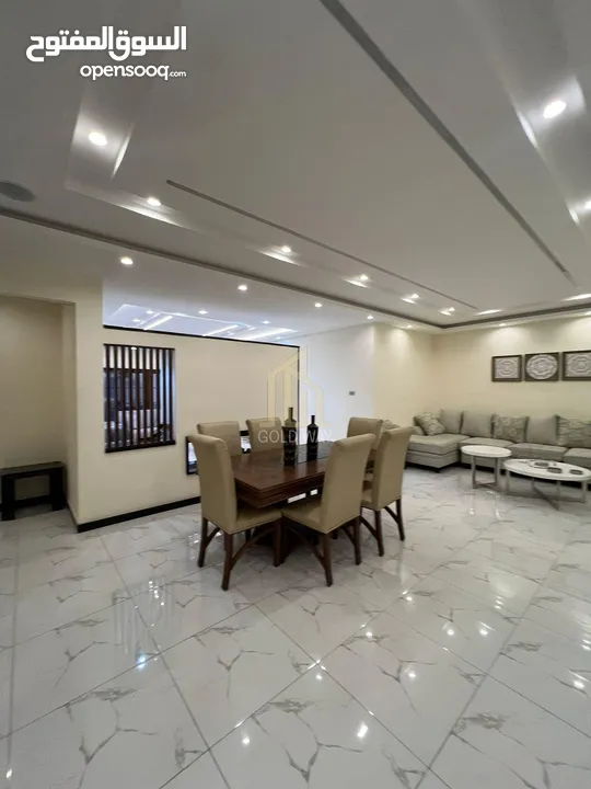 شقة مميزة للبيع طابق شبه أرضي 180م داخلي/ 130م خارجي في أجمل مناطق عبدون / ref 9356