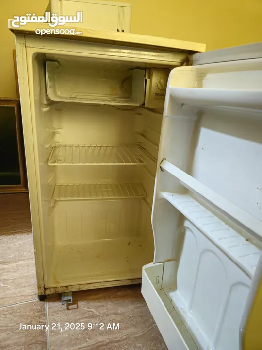 Two small LG refrigerator