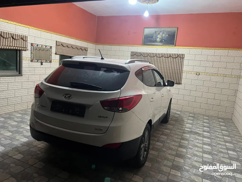 جيب توسان 2014 بوية شركة ولا غرام دهان حبة مميزة بكل تفاصيلها ايد 1 عداد حقيقي ب النايلون فعلي