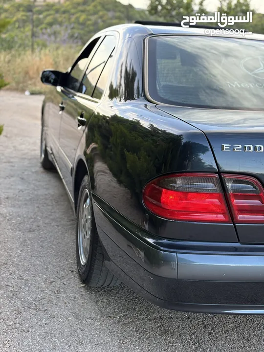 E200. 2002  قرش ونص 2002  رقم الهاتف بالوصف