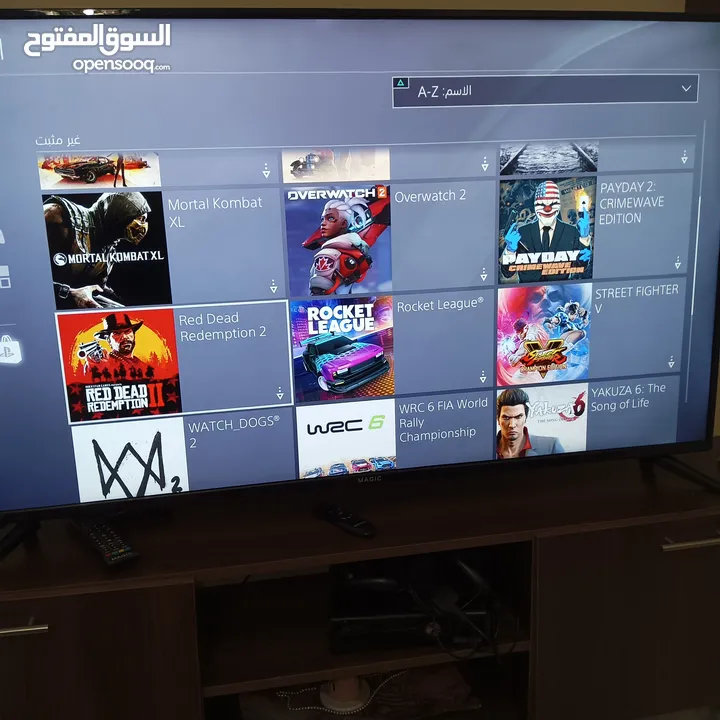بلايستيشن 4 مع حساب عليه 22 لعبة