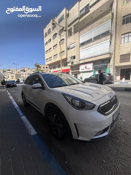 كيا نيرو 2019 -الاتصال على رقم الوطنيه في الوصف