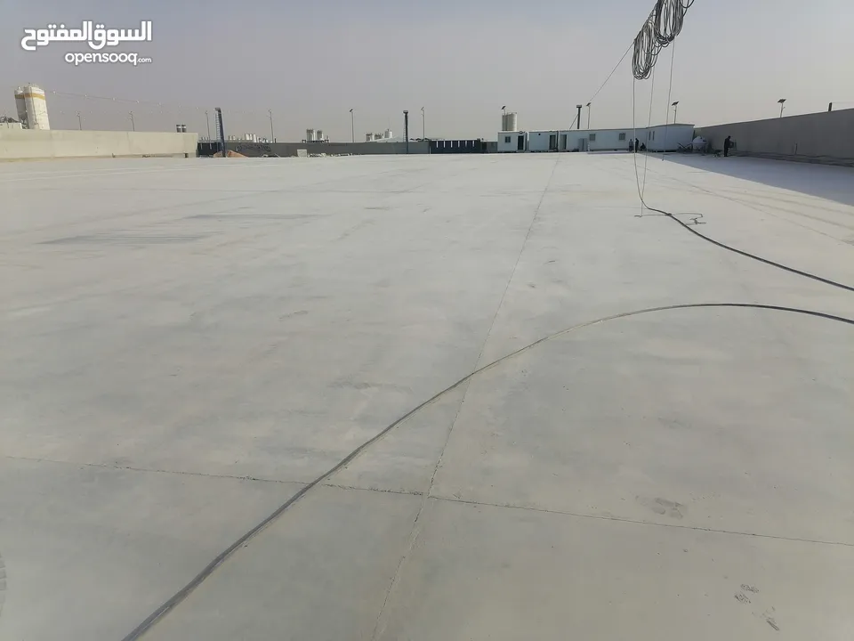 Helicopter finishing concrete