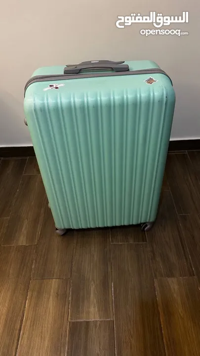 ‏شنطة سفر كبيرة  travel suitcase
