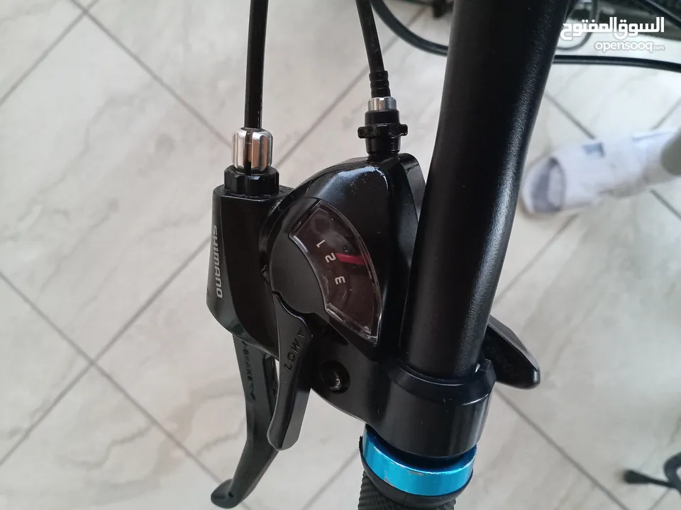 دراجة هوائية من نوع SPORTS INC من طراز SHIMANO جنط 26 باللون الأزرق اقرأ الوصف بدقة قابل للتفاوض