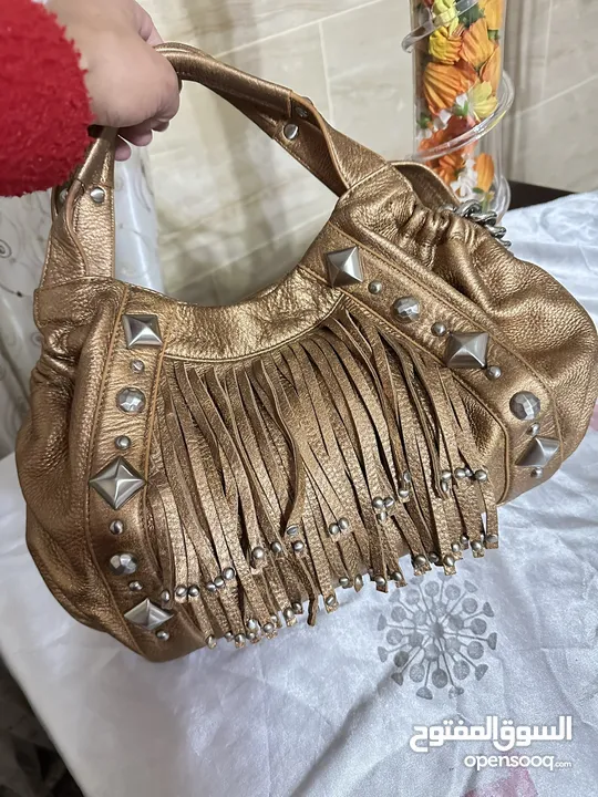 شنطه اصليه برادا