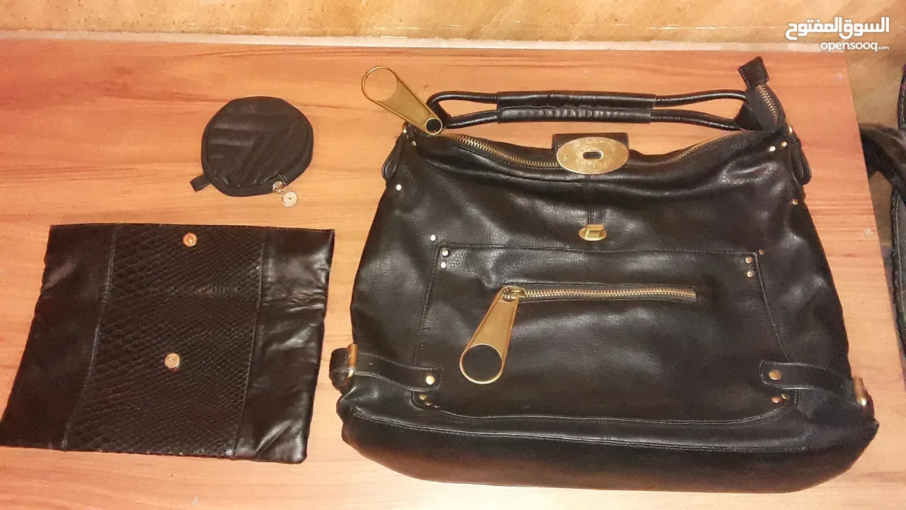 شنطة  يد ستاتي جلد طبيعي   نوع   PRADA