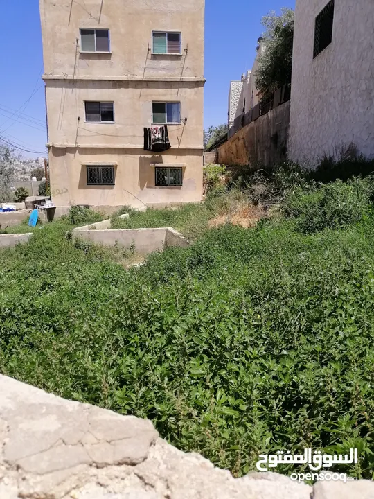 عماره مع ارض للبيع تصلح للاستثمار او اسكان