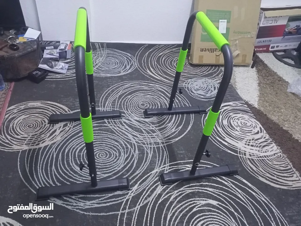 عقلة حائط تستحمل وزن 150+متوازي أرض يستحمل وزن 120+دامبلز وزن 25 للبيع كلهم