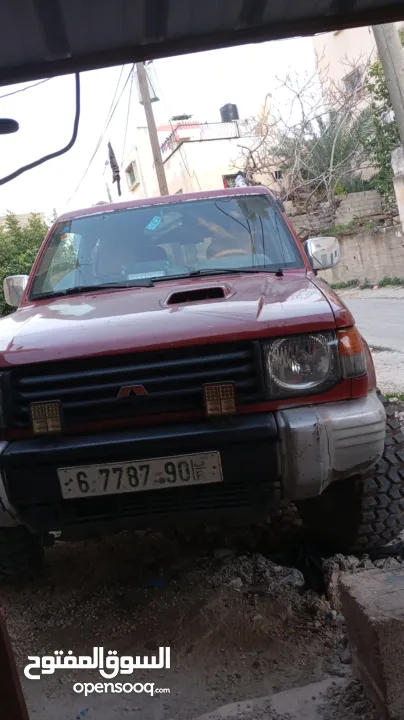 ميتسوبيشي باجيو1999  جير اتوماتيك 7 ركاب غرفه جلد عسليه  جير ومطور جاد مركبات