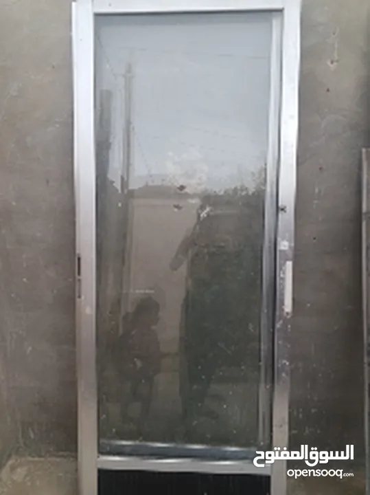 باب سحاب المنيوم ارتفاع مترين عرض 160مستعمل اجديد او واتس