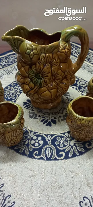 طقم ابريق و 6 كاسات فخار انتيك