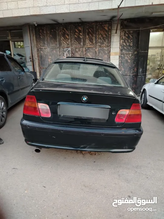 للبيع Bmw e46 2004  لون اخضر زيتي بجننن مع فتحة  دهان جديد السيارة كرتونة