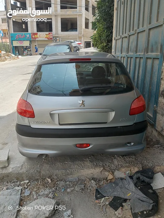 سيارة بيجو للبيع بحالة ممتازة السيارة جديده وكلشي فيها بالنايلون