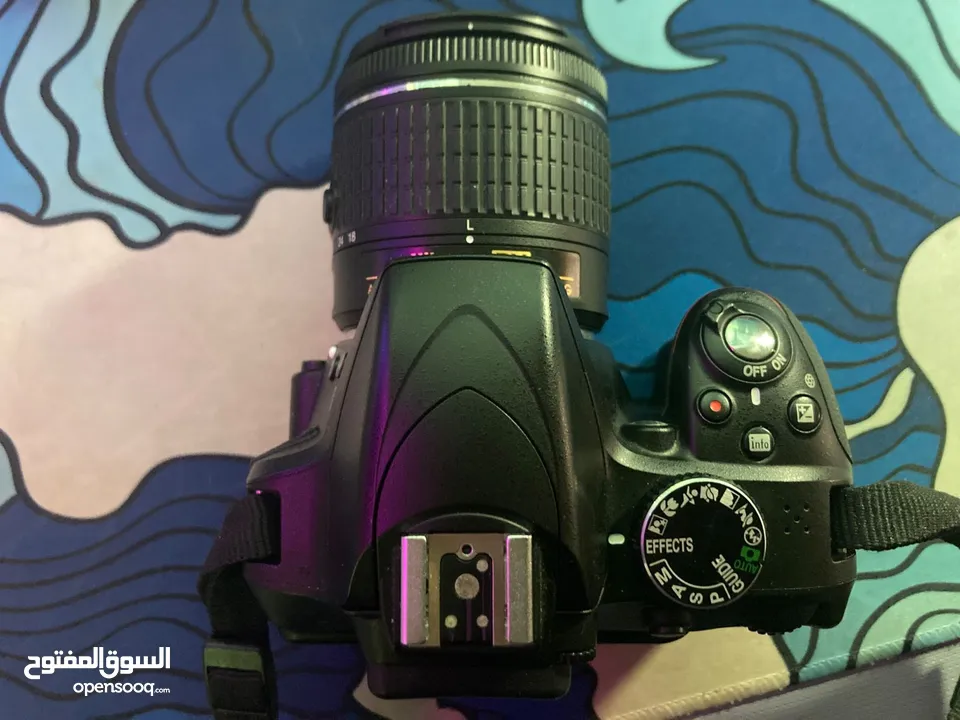 نيكون 3300d حال الوكاله  شتر قليل  عدسه 18/55 ستراب  وصلات  ترايبود  شاحن  بطاريه