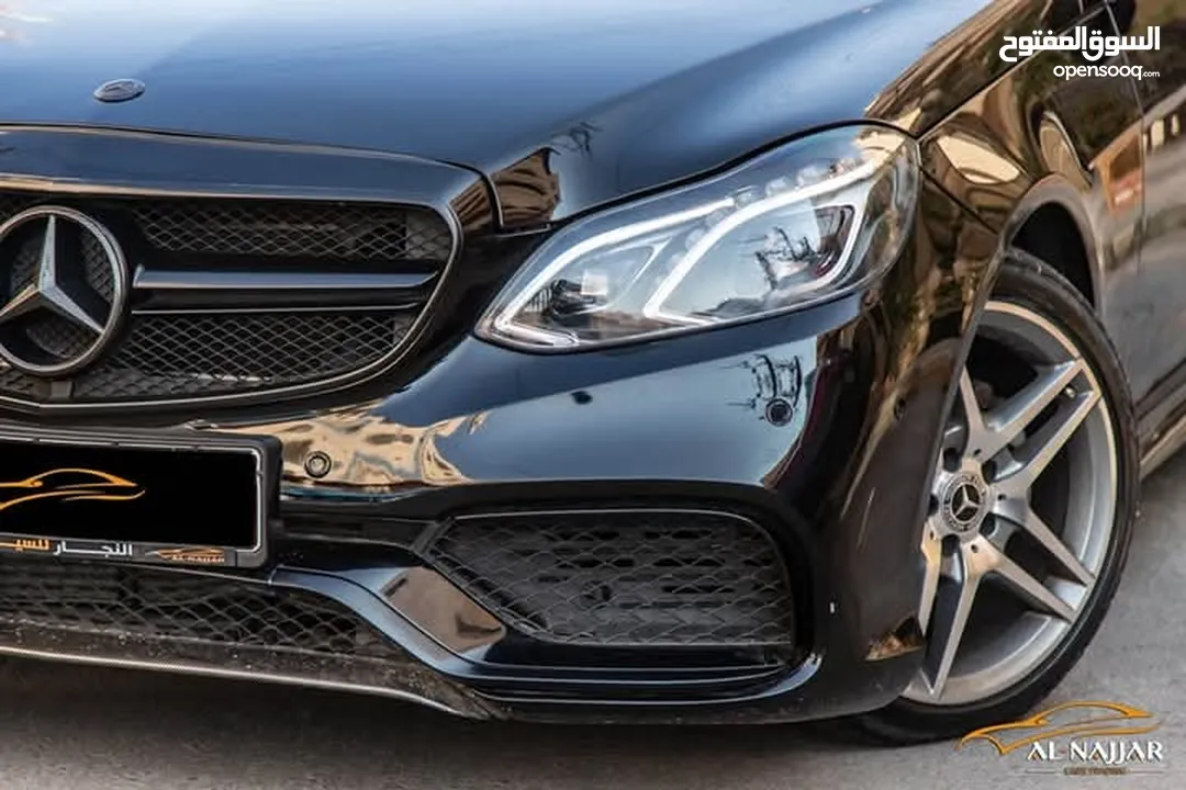Mercedes E200 Avantgarde Amg kit 2015  السيارة وارد و بحالة الوكالة