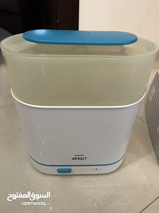 سرير بيبي محمول للبنات غير مستعمل مع معقم رضاعات philips