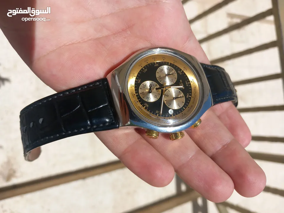 Swatch Irony Gold and Black  بسعر مميز جدا شبه وكالة