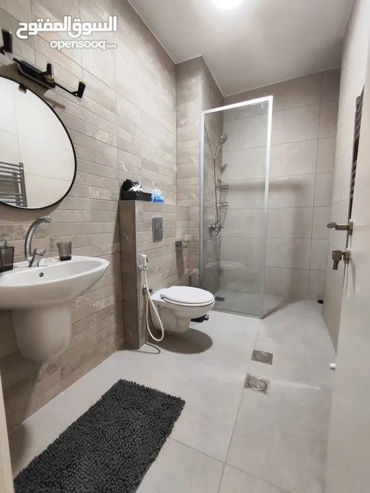 شقة مع حديققققة فخمه جديده مفروشة للإيجار في عين منجد