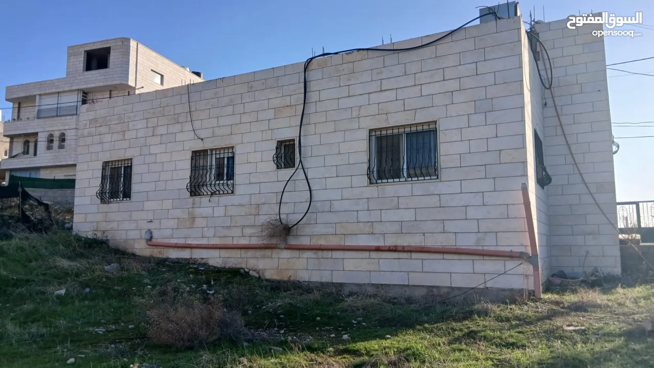 قطعة ارض 950 متر مع بيت