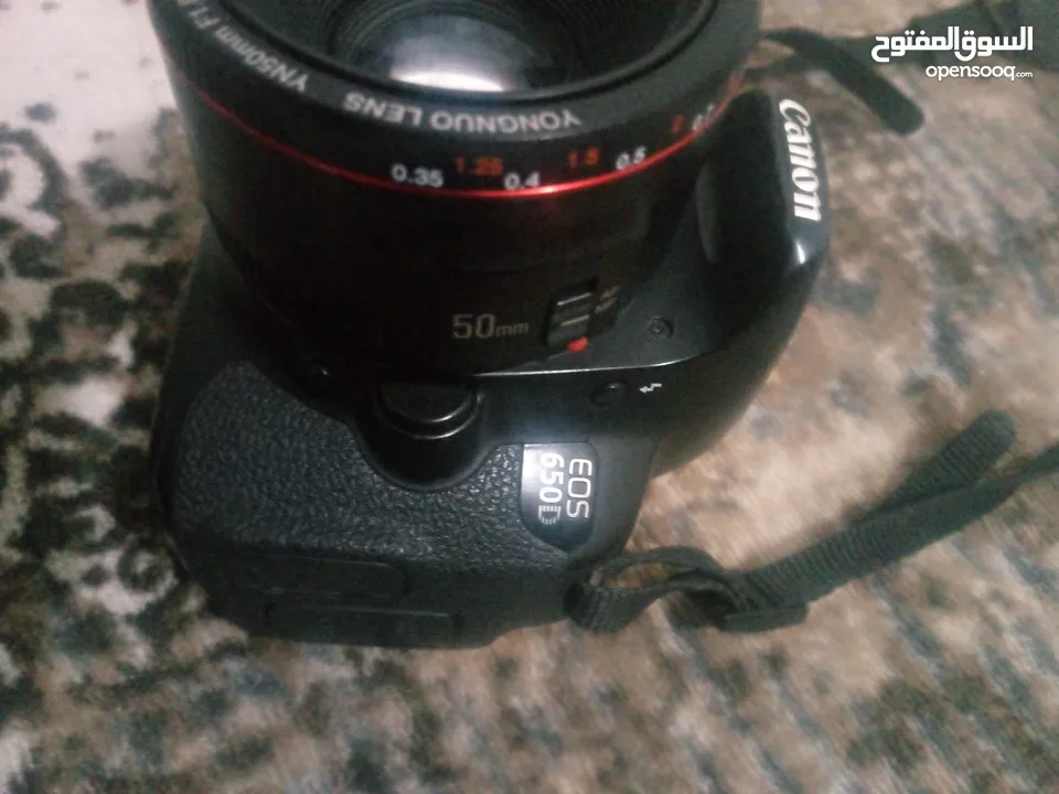 كاميرا كانون 650 D مع ثلاث عدسات وستاند