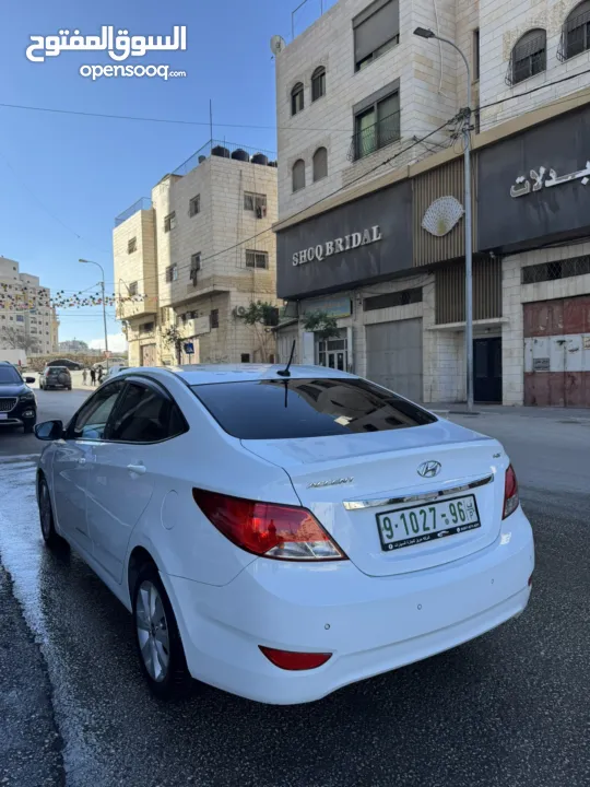 هونداي اكسنت 2015 محرك 1600 ديزل لون ابيض فرش جلد تشغيل بصمه حساسات خلفيه كاميرا خلفيه ترخيص وتامين