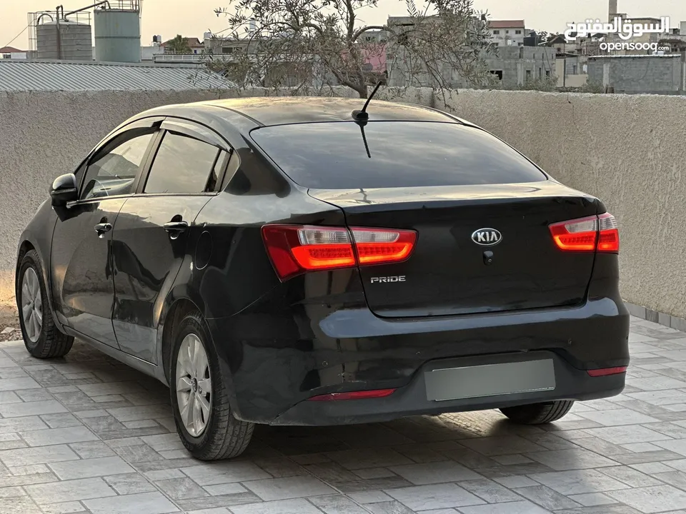 كيا برايد ترخيص 2015 جير اتماتيك ماطور 1400 بنزين