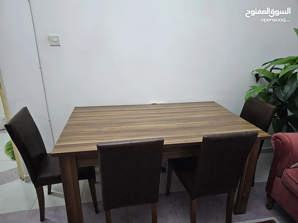 Dining table with five chairs good quality