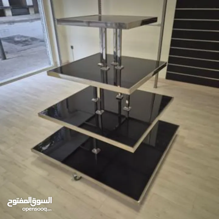 رفوف خشب بقواعد ستانليس