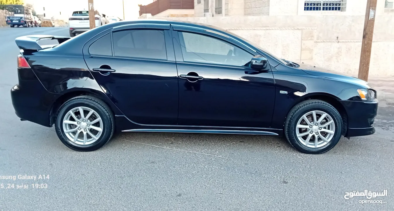 متسوبيشي لانسر فراشة موديل 2015 فحص مرفق مع الصور بحالة الوكاااااالة  ماشية 49 الف km  أصلي