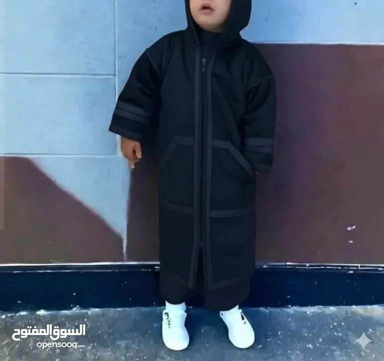 فروة شتوية للأطفال بقبعة مدمجة دفء مثالي وأناقة تناسب كل الأوقات معطف عملي بتصميم أنيق يوفر الدفئ