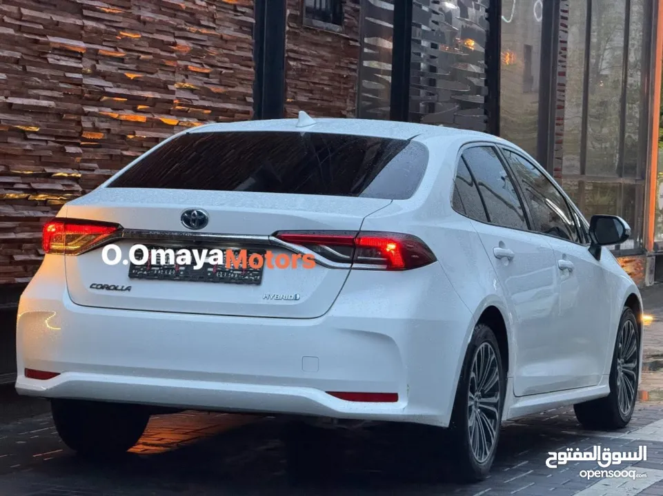 Toyota Corolla Hybrid 2023 عداد قليل ، فحص نخب ولا غرام بوية ، أعلى فئة إضافات و بسعرررررر مميزز