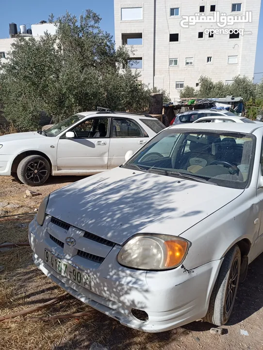 سيارة هونداي فيرنا 2003ميكانيكيات جيدة جدا وعيوب بسيطة بالبودي