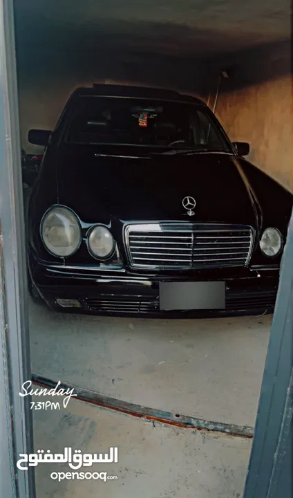مرسيدس W210