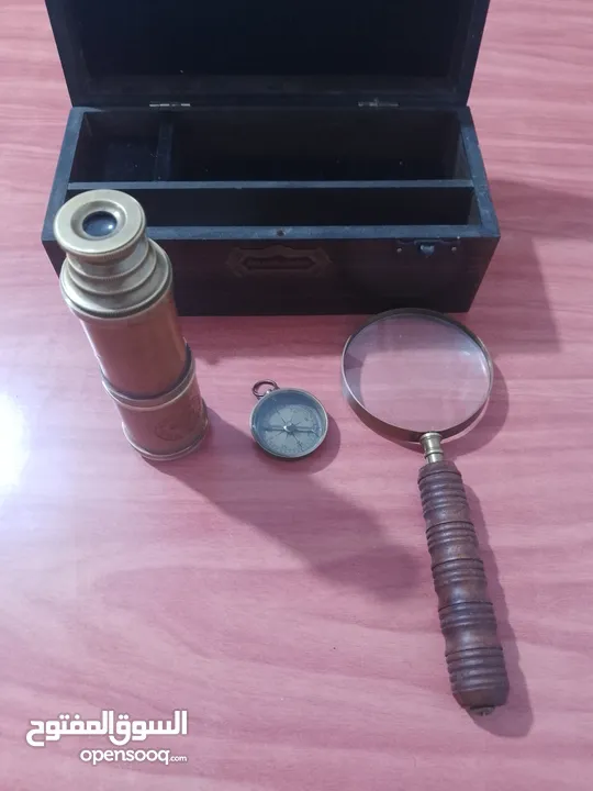 منظار مع بوصلة وعدسة كلها نحاس