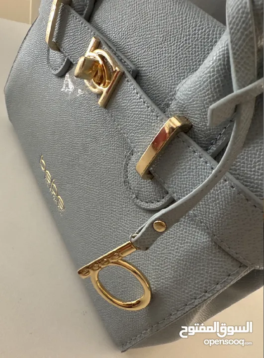 New Bebe women’s evie satchel bag