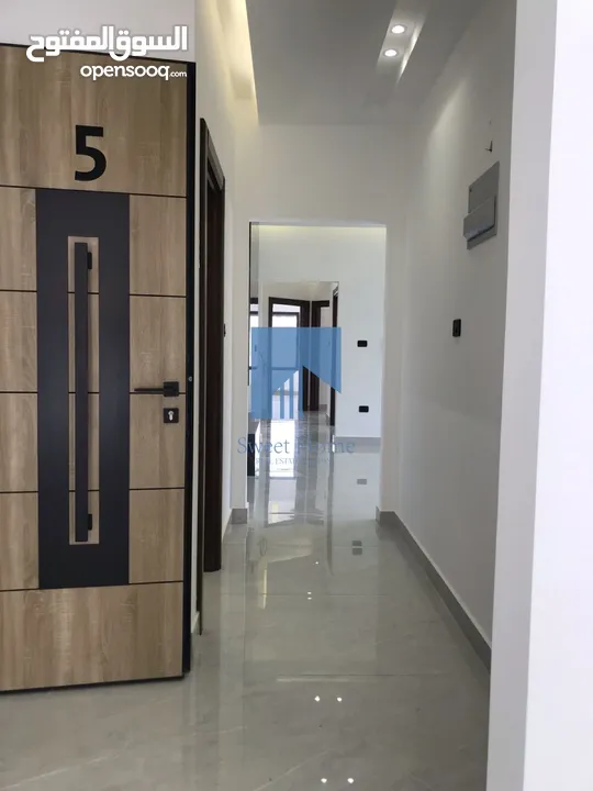 شقة أرضية فاخرة للبيع في الكرسي - خلف إدارة السير 165م مع ترس 30م تشطيب سوبر ديلوكس لم تسكن