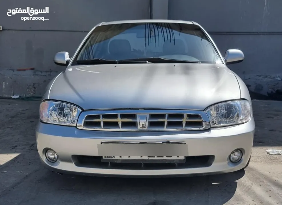 كيا سبيكترا 2001 بسعر 2400 جير عادي سياره نظيفه جدا  kia spectra 2001