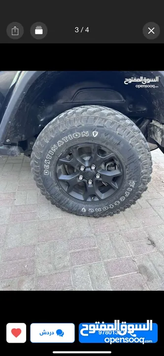 5 rims and tires of jeep wrangler