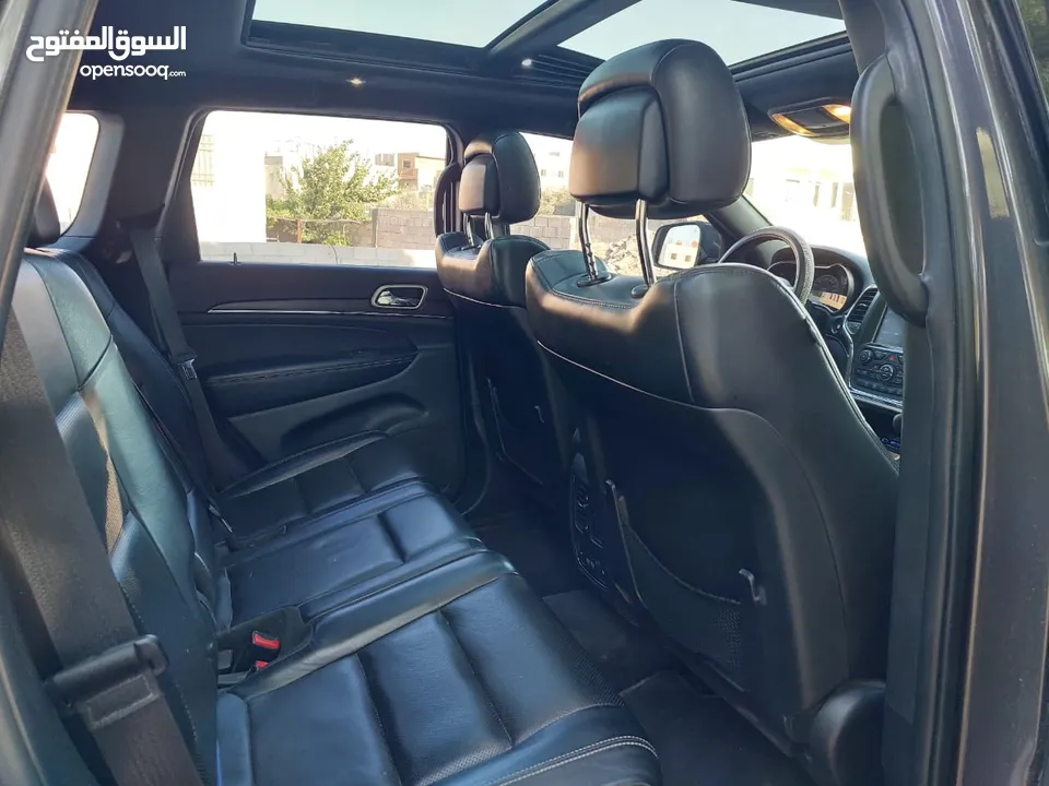 جيب جراند شيروكي فل الفل اعلى فئة بانوراما 2014 فحص كامل لون فيراني مميز بسعر مغري قابل للبدل والاقص