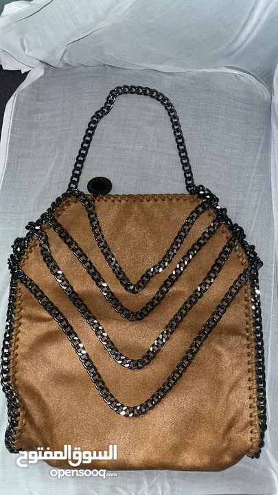 Stylish brown bag with dark silver details